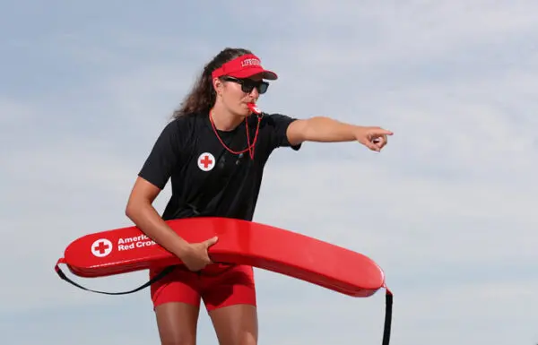 a lifeguard is instructing