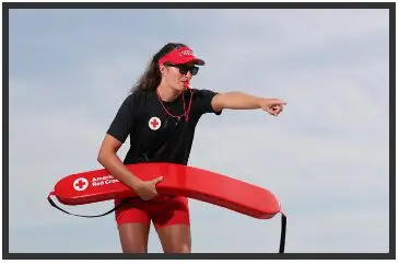 a lifeguard is instructing